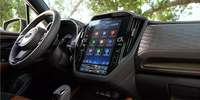 SUV dashboard with touchscreen infotainment system and controls