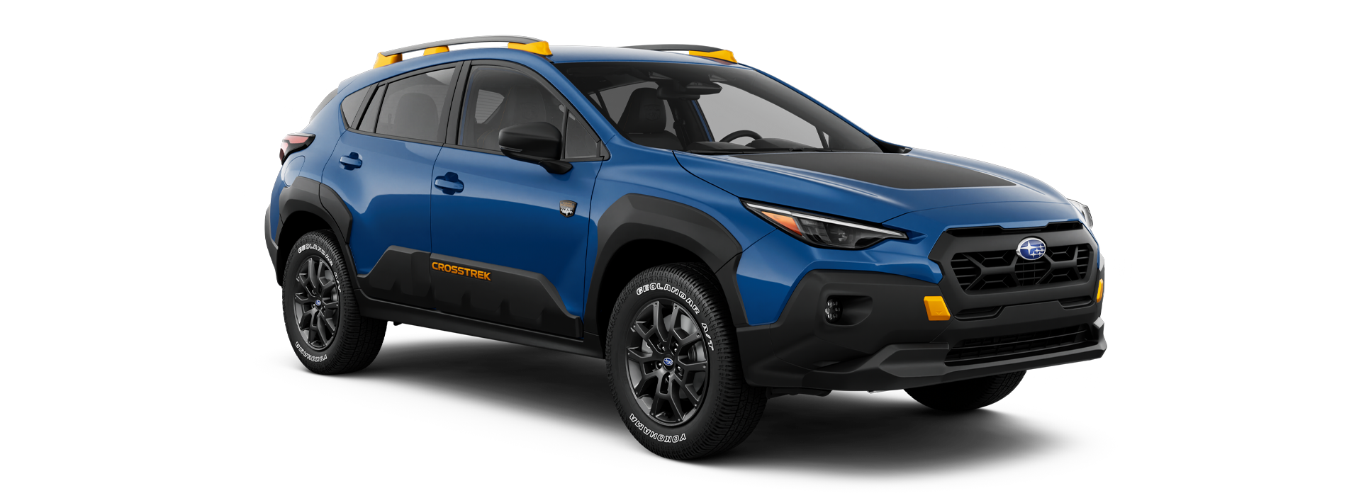 Subaru Crosstrek with yellow roof rails and contrasting black body cladding.